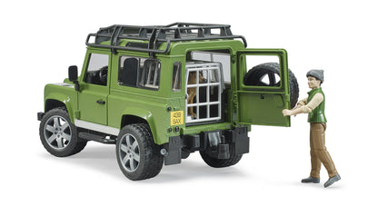 Land Rover Defender Station Wagon (grün/schwarz, Inkl. Förster und Hund)